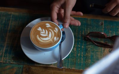 cup-of-coffee-and-latte-art-in-cafe-bar-9NKSTUE